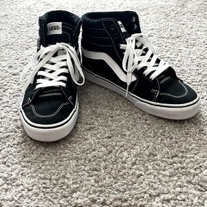 Woman’s high top Vans